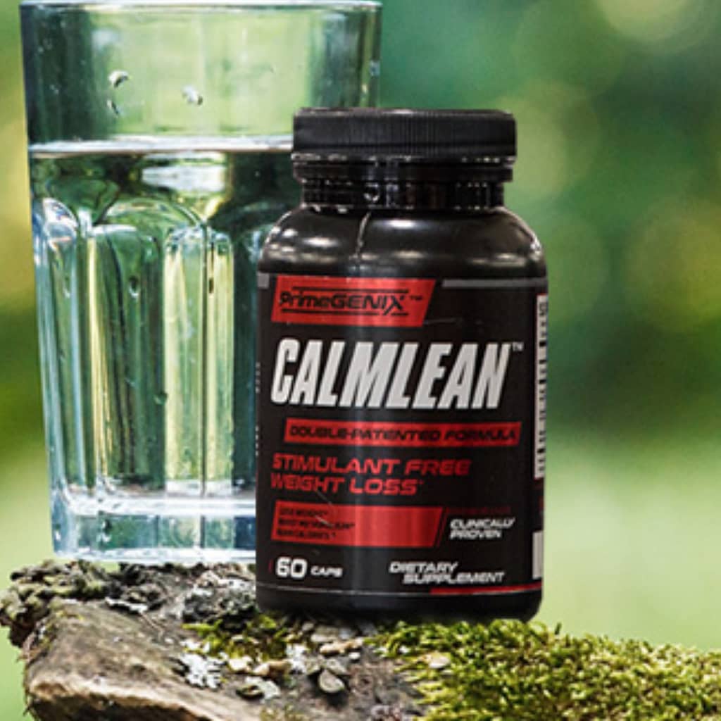 A bottle of Calm Lean supplements with a cup of water on a tree stump in nature. Calm Lean for rapid weight loss
